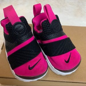 Nike pink and black shoes